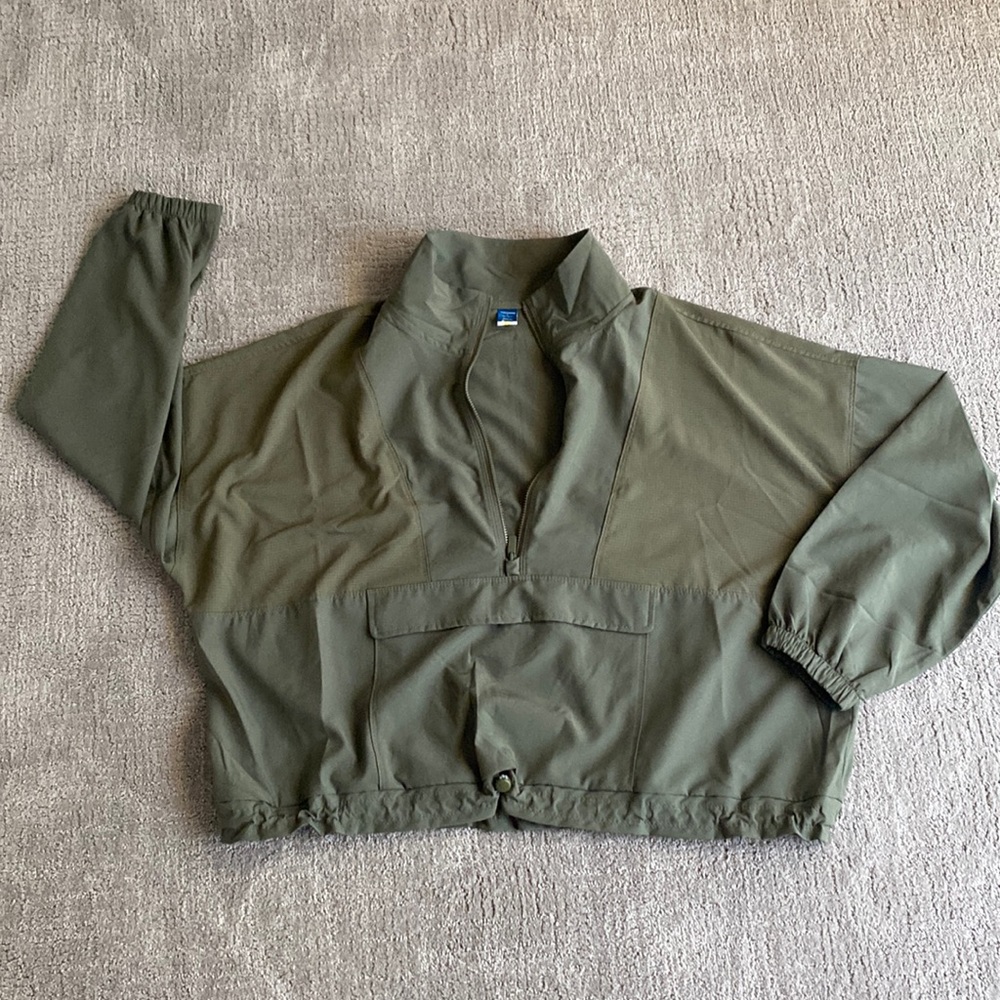 Pullover quarter zip tech fabric jacket